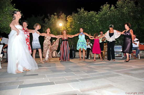 After the ceremony - the bride leads a traditional dance at the Reception.