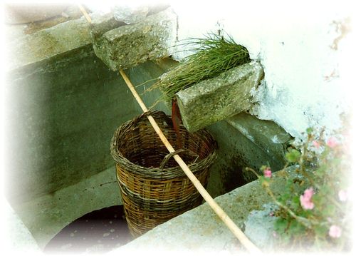 Cretan wine, photograph of traditional wine-making, filtering aftyer treading, North-Western Crete.