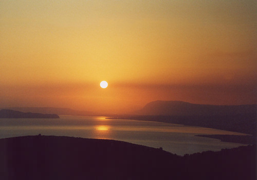 Stunning sunrise, over Chania, Omalos mountains to the right.  Nomos Chanion, North Western Crete.