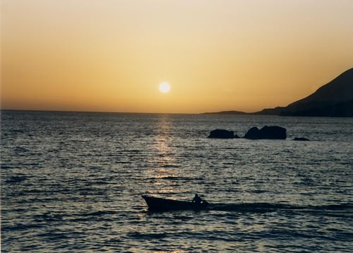 Libyan sea off Chora Sfakion - onset of a working day for this lone fisherman.