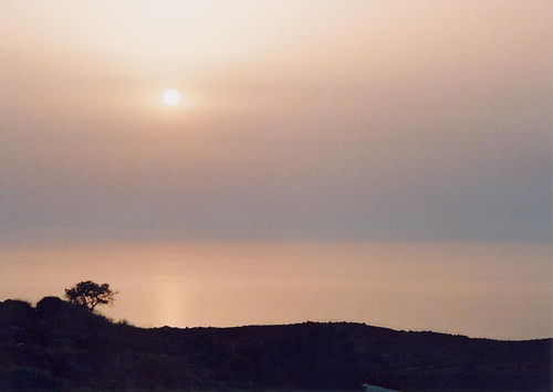 Mist-shrouded sunrise over the bay of Chania, Nomos Chanion, North West Crete.