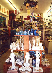 Gift shop 'Elaia' sells traditional pottery, jewelry, postcards, woven goods. books.